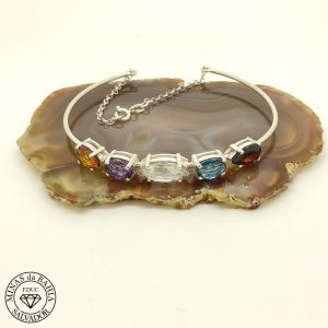 Bracelet avec aigue-marine, citrine, améthyste, topaze bleue et grenat